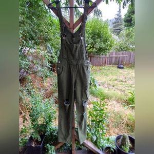 Distressed green juniors overalls